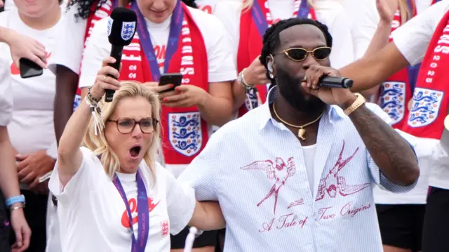 England manager Sarina Wiegman (centre right) and Burna Boy during a Homecoming Victory Parade