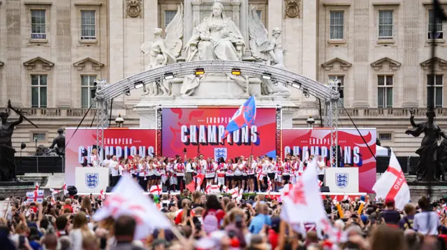 England on stage during a Homecoming Victory Parade on in front of Buckingham Palace, London.