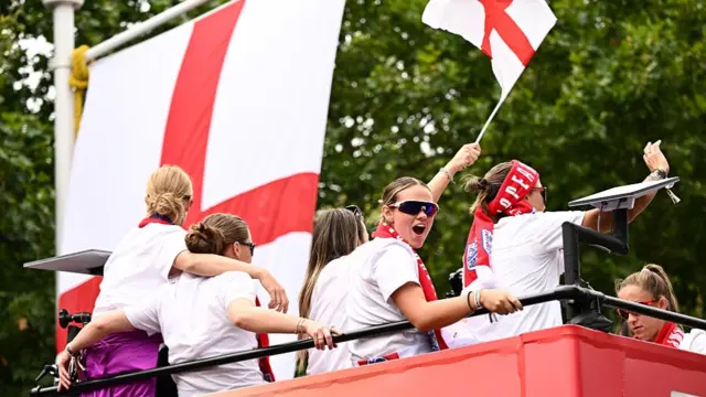 Grace Clinton of England reacts during the England Women's team victory parade and celebration
