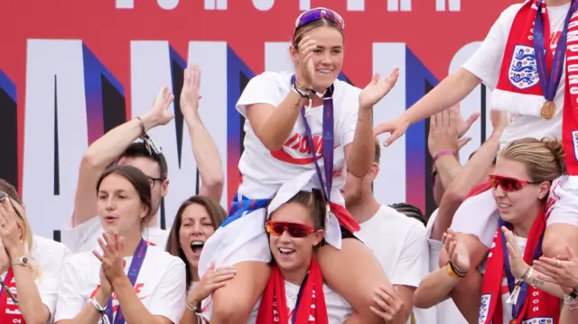 England's Grace Clinton (top) during a Homecoming Victory Parade on the Mall, London
