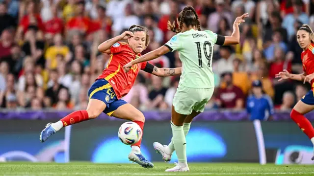 Claudia Pina of Spain and Diana Gomes of Portugal battle for the ball during the UEFA Womens EURO 2025 Group B match between Spain and Portugal at Stadion Wankdorf on July 3, 2025 in Bern, Switzerland.