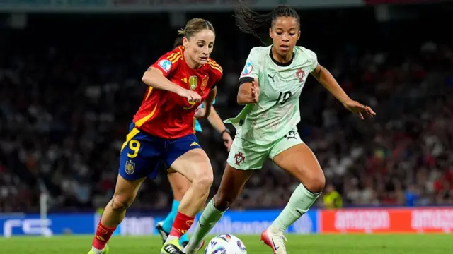 Esther Gonzalez of Spain is challenged by Jessica Silva of Portugal during the UEFA Women's EURO 2025 Group B match between Spain and Portugal at Stadion Wankdorf on July 03, 2025 in Bern, Switzerland.