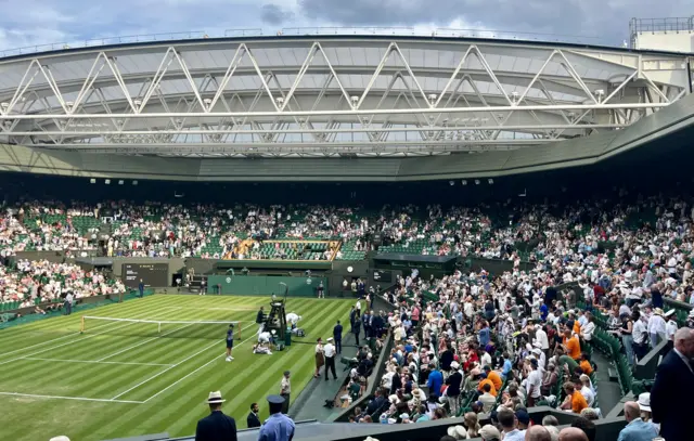Centre Court as Jannik Sinner warms up