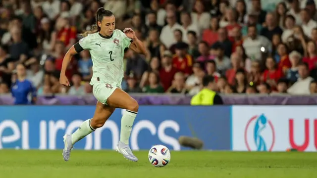 Catarina Amado of Portugal runs with the ball during the UEFA Women's EURO 2025 Group B match between Spain and Portugal at Stadion Wankdorf on July 3, 2025 in Bern, Switzerland.