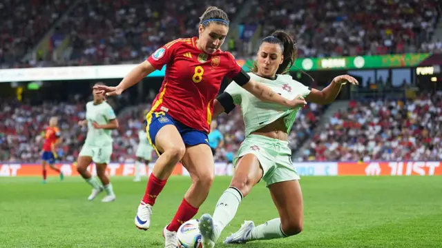 Mariona Caldentey of Spain is challenged by Catarina Amado of Portugal during the UEFA Women's EURO 2025 Group B match between Spain and Portugal at Stadion Wankdorf on July 03, 2025 in Bern, Switzerland.