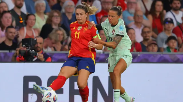 Spain's Alexia Putellas in action with Portugal's Tatiana Pinto