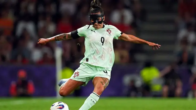Ana Borges of Portugal passes the ball while wearing a protective face mask during the UEFA Women's EURO 2025 Group B match between Spain and Portugal at Stadion Wankdorf on July 03, 2025 in Bern, Switzerland.