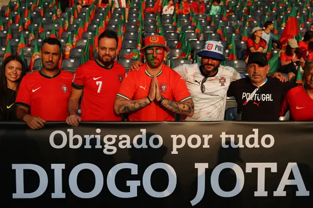 Supporters of Portugal show a message in memory of former football player Diogo Jota