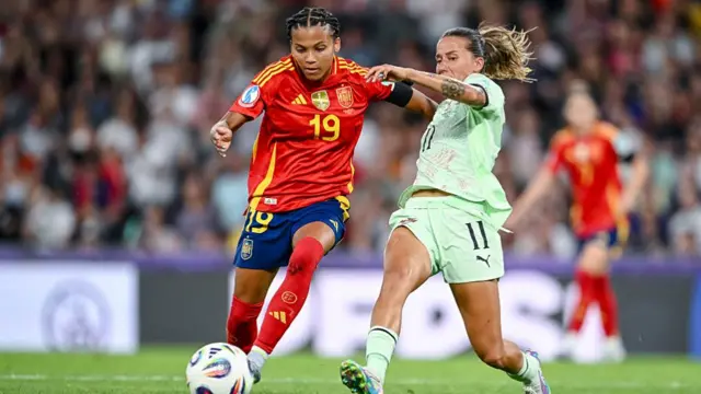 Vicky Lopez of Spain and Tatiana Pinto of Portugal battle for the ball during the UEFA Womens EURO 2025 Group B match between Spain and Portugal at Stadion Wankdorf on July 3, 2025 in Bern, Switzerland.