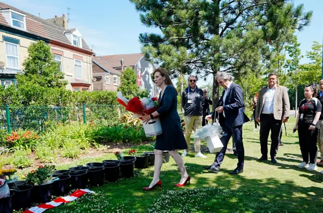Deputy Prime Minister Angela Rayner and Steve Rotheram, Metro Mayor of the Liverpool City Region, leave a floral tribute in memory of Diogo Jota who has died at the age of 28.