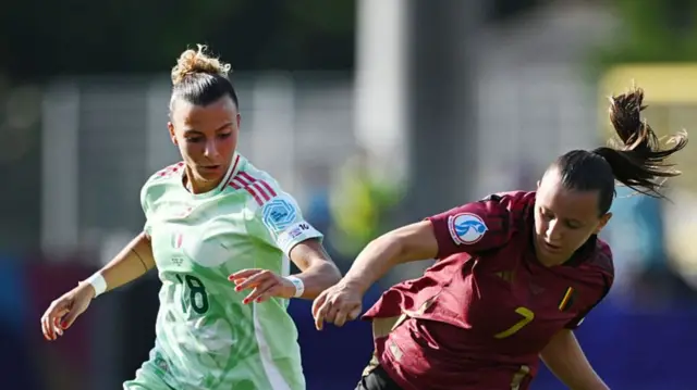 Arianna Caruso of Italy competes for the ball with Hannah Eurlings