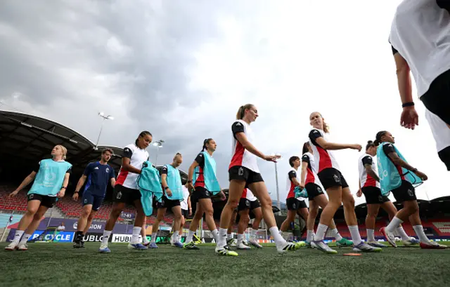 The players of Belgium warm up with teammates