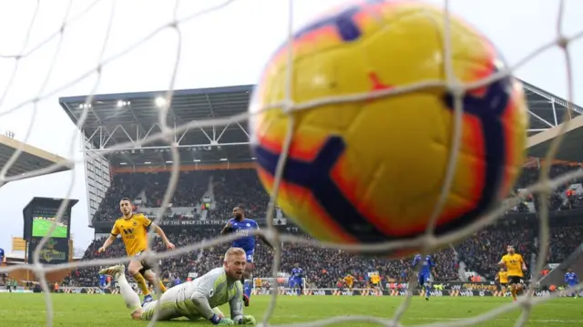 Jota (left) completing his hat-trick in a 4-3 win against Leicester City in 2019