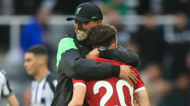 Jurgen Klopp hugs Diogo Jota