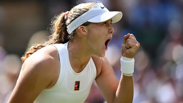 Mirra Andreeva celebrates after winning a point