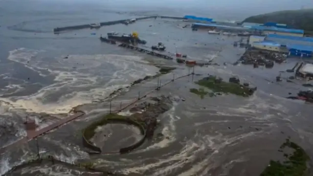 Seen from above, an area of land is flooded