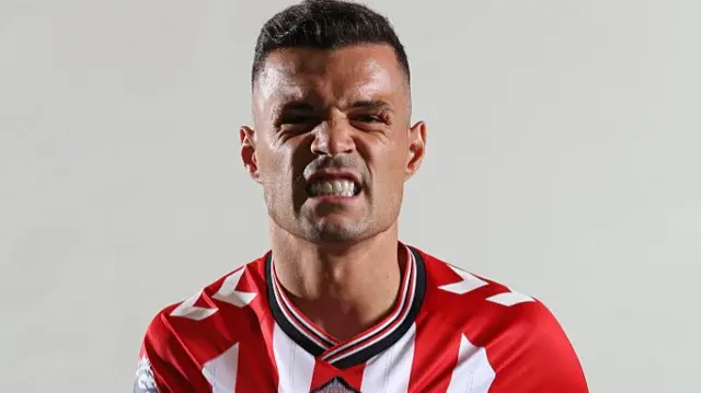 Granit Xhaka posts in Sunderland shirt
