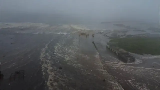 ) An aerial view of the city of Severo-Kurilsk flooded due to tsunami triggered by the 8.8 magnitude earthquake.