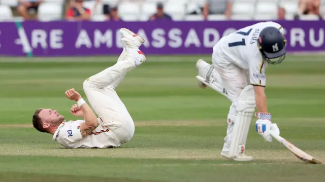 Sam Cook takes a tumble