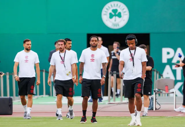 The Rangers squad arriving at the Olympic Stadium