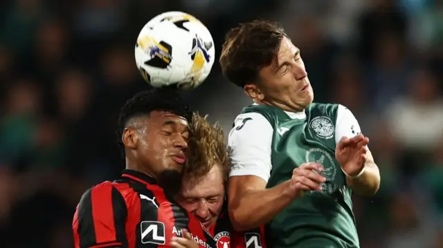 idtjylland's Oliver Sorensen and Hibs' Josh Campbell