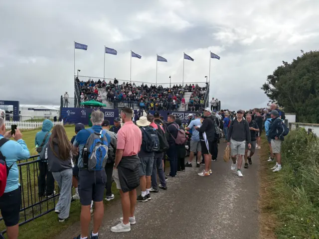 Crowds gather at the first tee at Royal Porthcawl
