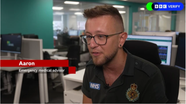 A still image from Olga's digital video. It shows Emergency medical advisor Aaron in uniform sitting down and giving an interview