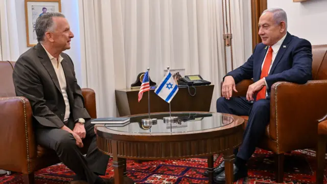 Steve Witkoff sits in a chair opposite Netanyahu
