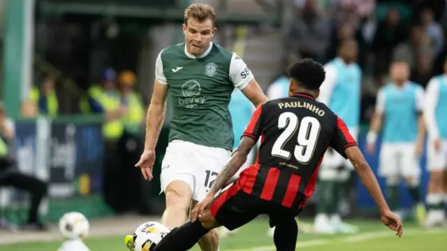 Hibernian's Chris Cadden and Midtjylland's Paulinho