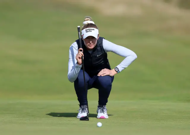 Nelly Korda lines up a putt