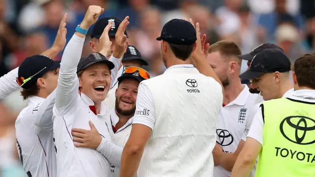 Ollie Pope celebrates a successful review