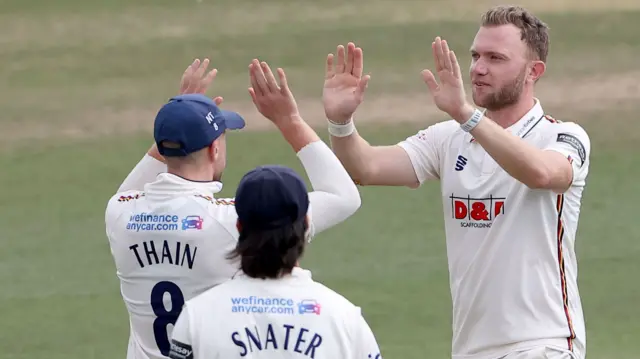 Sam Cook celebrates wicket