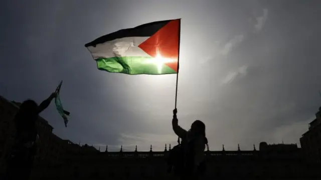 People participate in a demonstration for Palestine