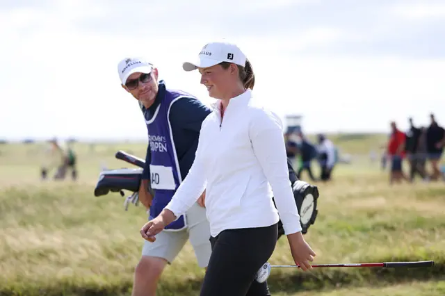 Lottie Woad and her caddie