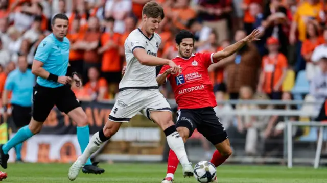 Dundee United's Krisztian Keresztes and UNA Strassen's Diogo Pimentel