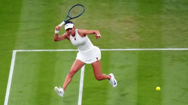Emma Raducanu plays a forehand