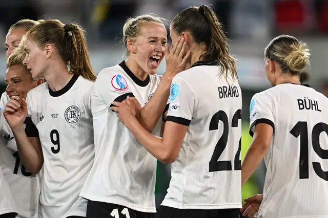 Lea Schuller of Germany celebrates her goal with Jule Brand of Germany during the UEFA Womens EURO 2025 Group C match between Germany and Poland at Arena St. Gallen on July 04, 2025 in St Gallen, Switzerland.