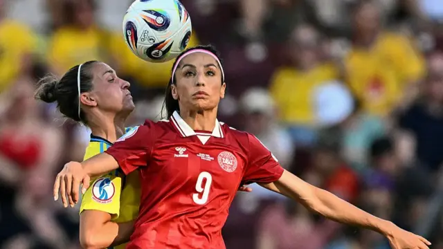 Denmark's forward #09 Nadia Nadim fights for the ball with Sweden's defender #03 Linda Sembrant during the UEFA Women's Euro 2025 Group C football match between Denmark and Sweden
