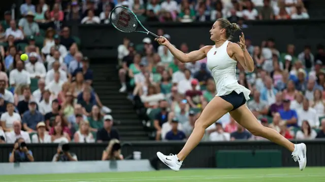 Aryna Sabalenka plays a forehand