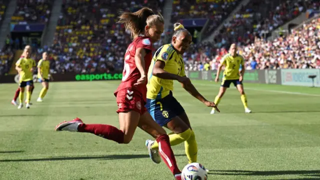 Denmark's Frederikke Thogersen in action with Sweden's Madelen Janogy