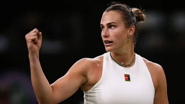 Aryna Sabalenka celebrates after winning