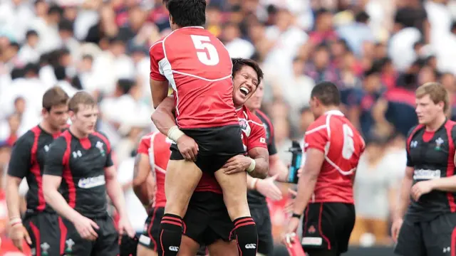 Takashi Kikutani of Japan and Shoji Ito celebrate victory