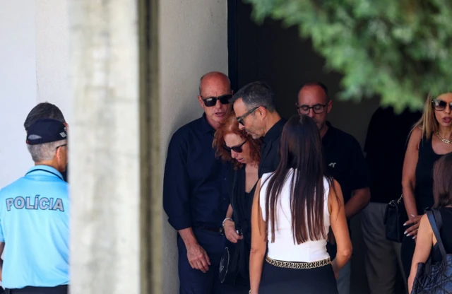Diogo Jota's parents Isabel and Joaquim Silva and Diogo Jota's agent Jorge Mendes leave after visiting the Chapel of the Resurrection, the location of the wake for Liverpool's Portuguese soccer player Diogo Jota and his brother Andre Silva, who died in a car crash near Zamora, Spain, in Gondomar