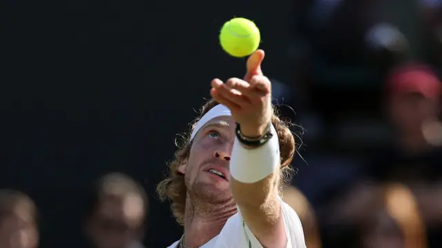 Andrey Rublev serves