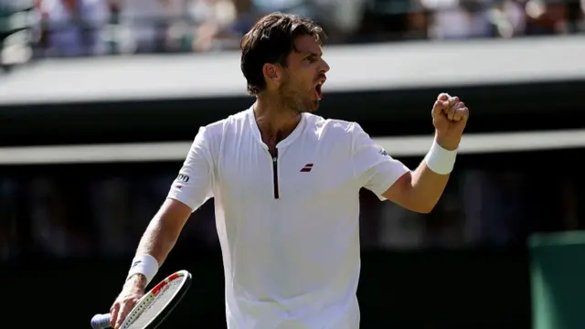 Cameron Norrie reacts