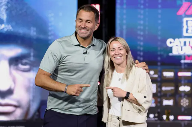 Eddie Hearn and Molly McCann point at each other