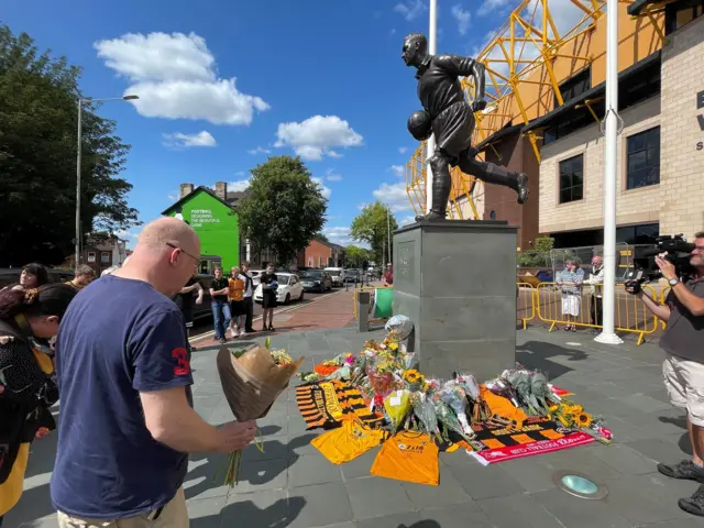 Tributes are also being made to Diogo Jota and his brother André Silva outside of Molineux, Wolverhampton Wanderers' stadium.