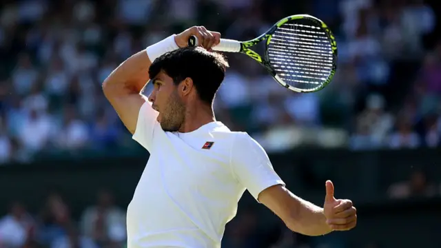 Carlos Alcaraz plays a forehand