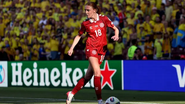 Sara Holmgaard of Denmark runs with the ball during the UEFA Women's EURO 2025 Group C match between Denmark and Sweden at Stade de Geneve