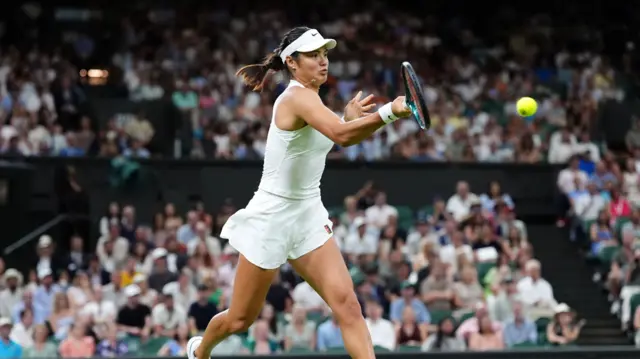 Emma Raducanu hits a forehand